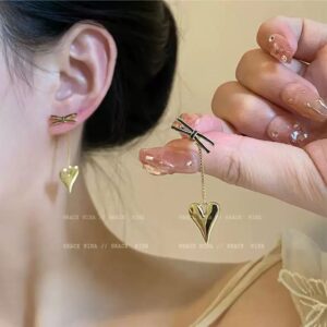 Golden bow heart earrings