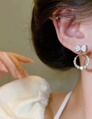 White Bow Stone Earrings