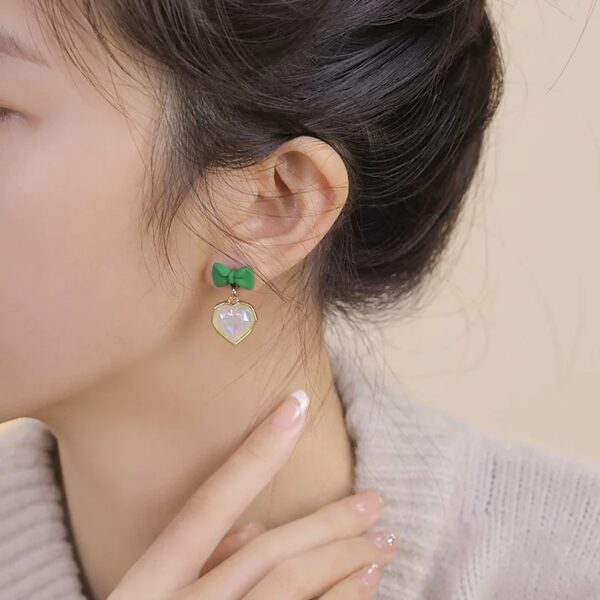Green Bow Shimmer Heart Earrings - Image 2