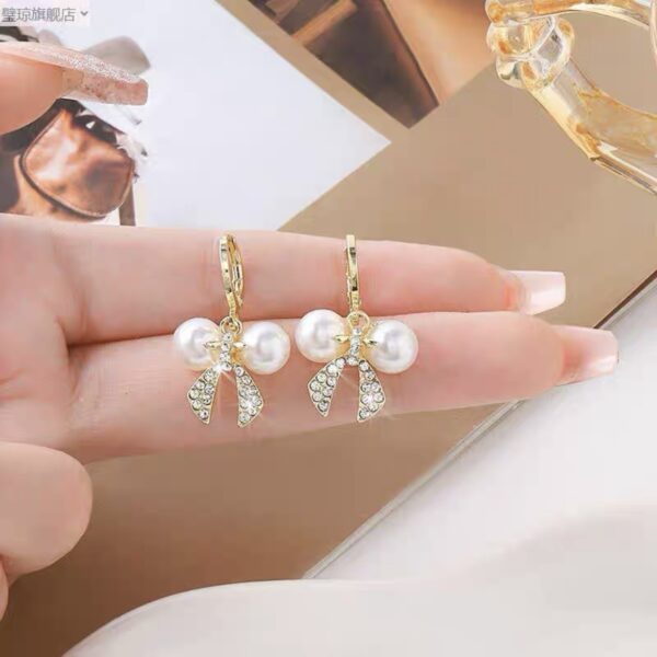 Hoop Pearl Bow Earrings - Image 2